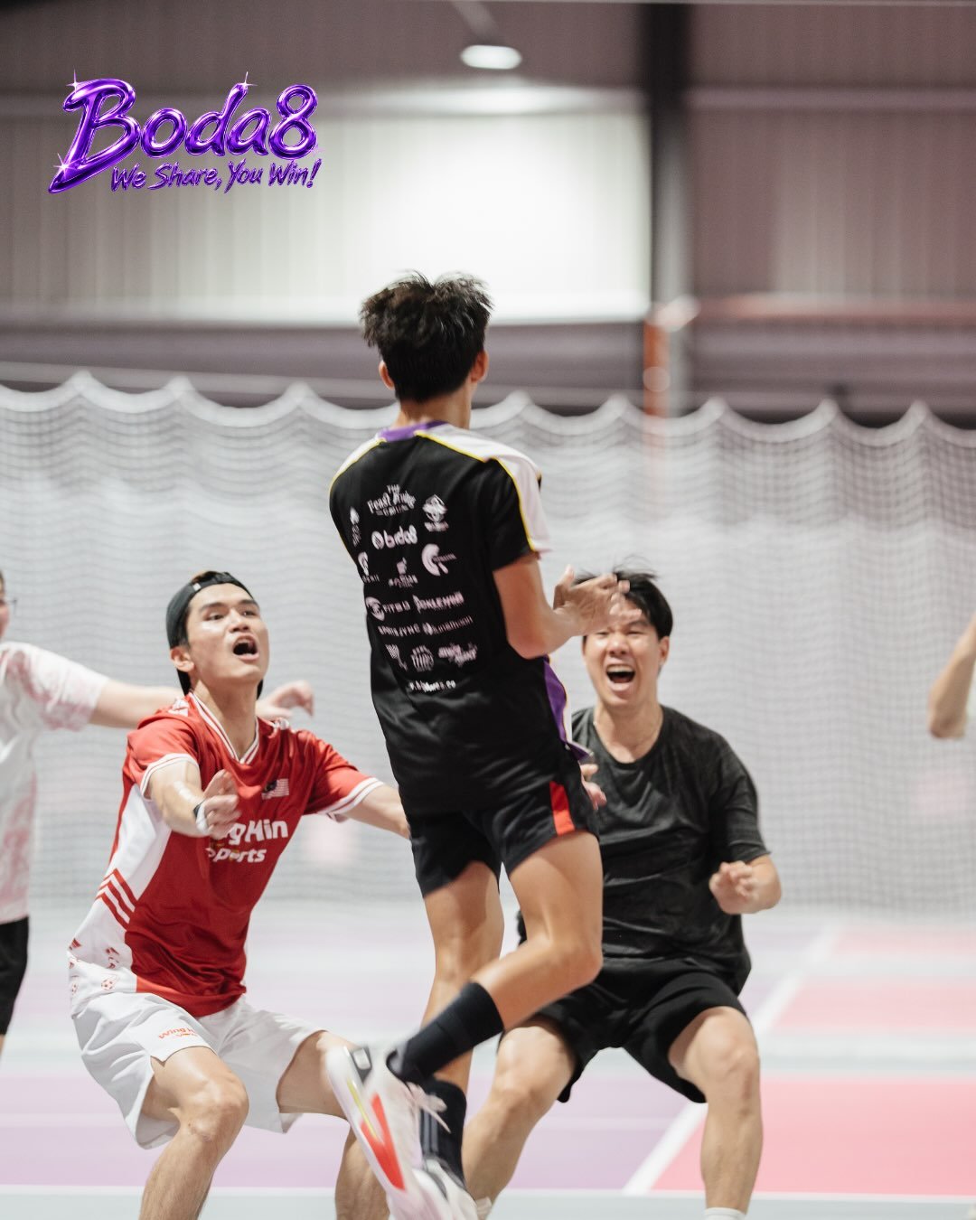 Boda8 Pickleball Team Event players celebrate a point during the tournament in Malaysia.