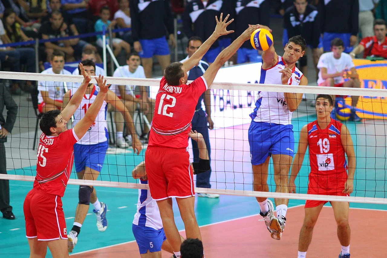 Bulgaria and Serbia compete during an international men's volleyball match.