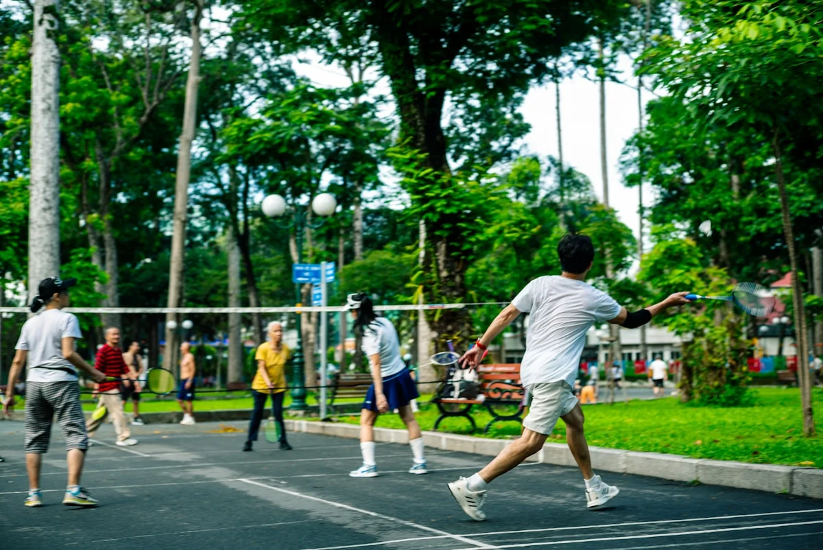 Players competing in badminton.